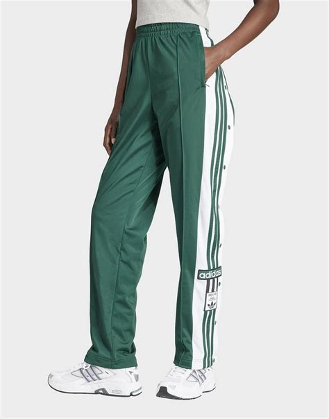 adidas broek met gouden streep zonder adidas teken|Adidas broek.